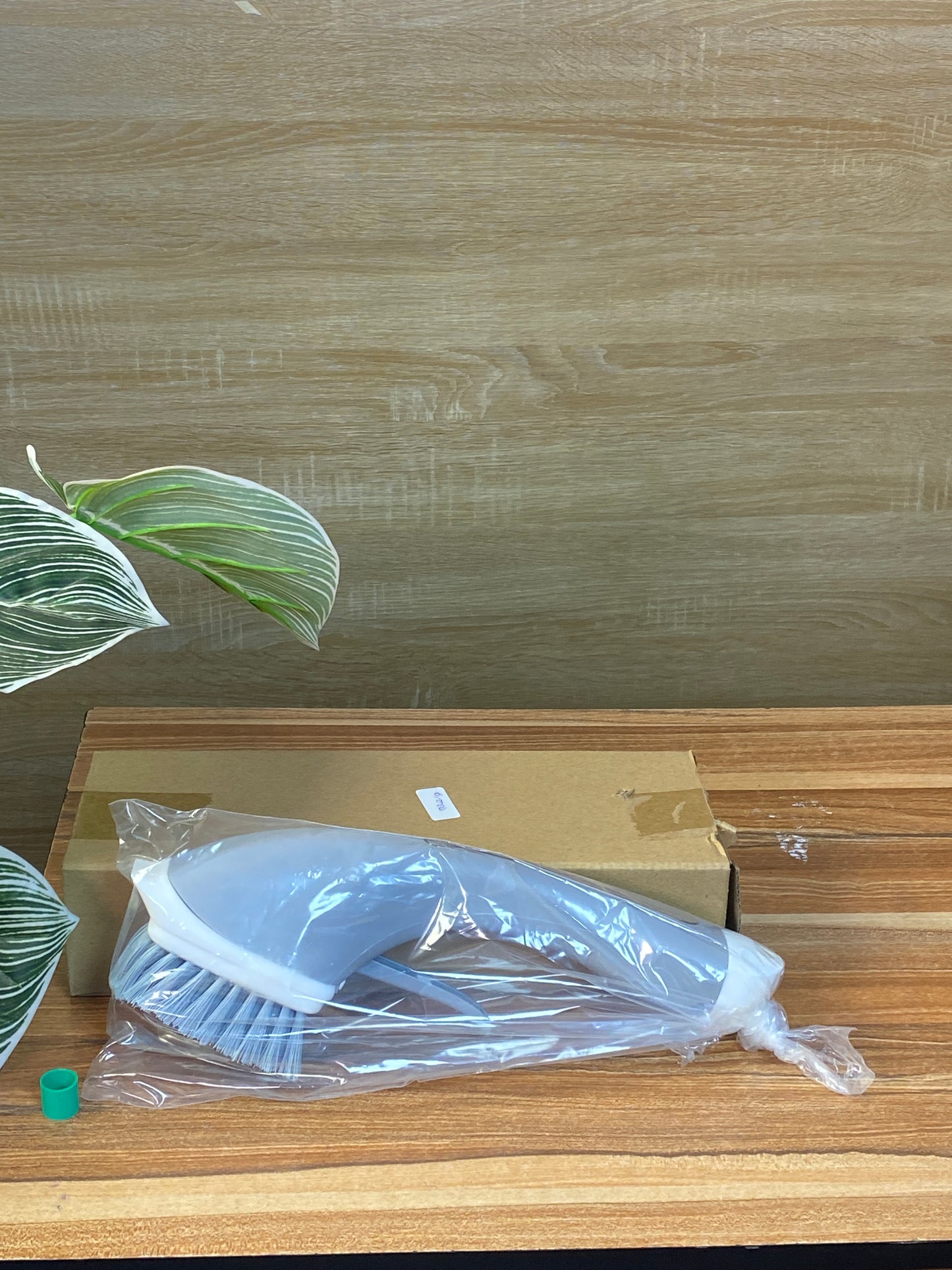 Liquid soap dispensing scrub brush